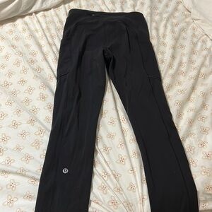 Black lululemon size 4 leggings with side and back pockets. Excellent condition